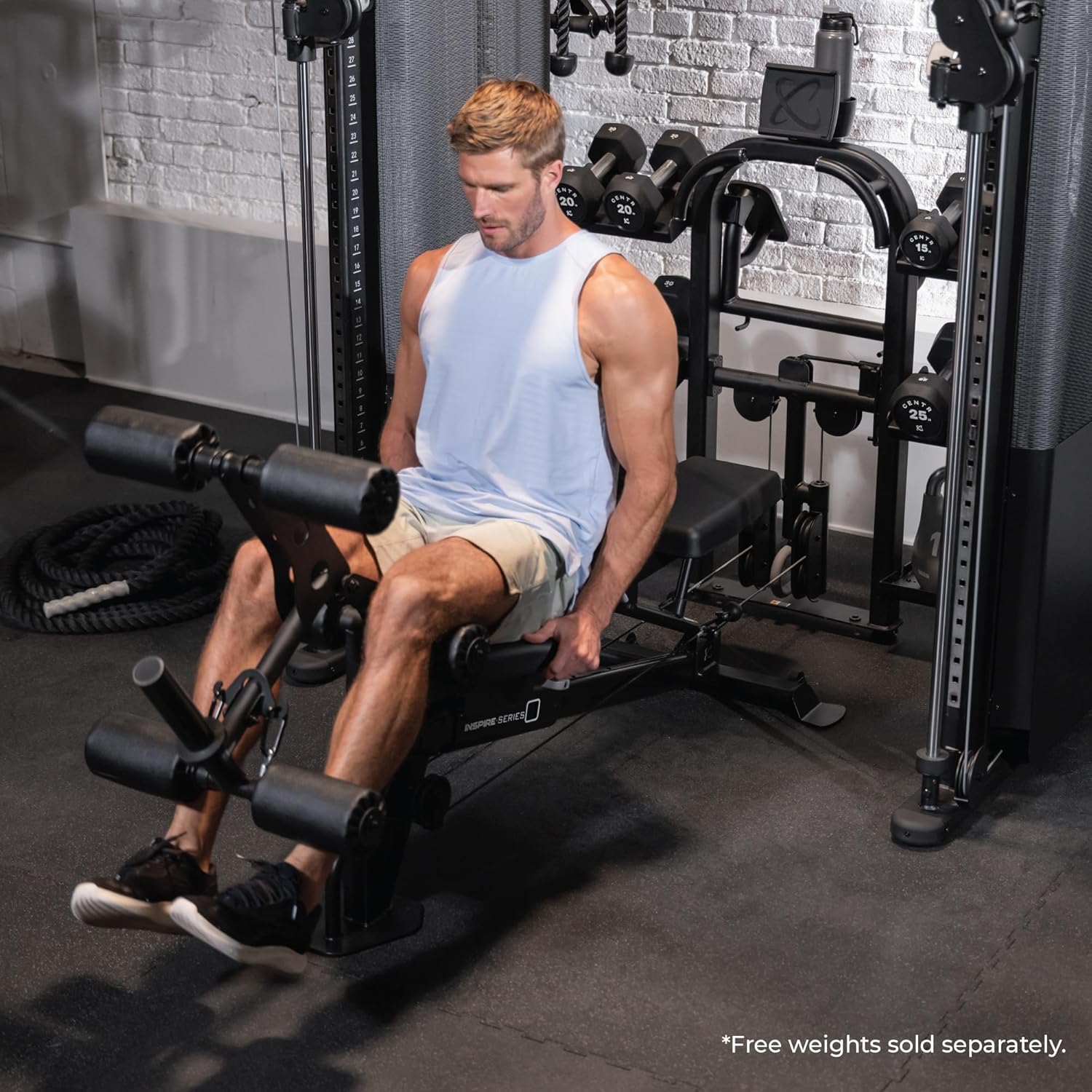Man exercising on a weight bench in a gym setting