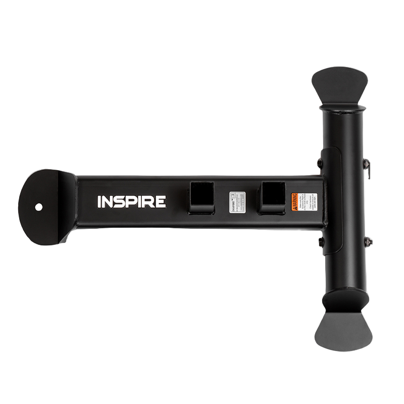 Black Inspire Fitness accessory base for fitness attachments, with visible brand name and slots for holding gym equipment.
