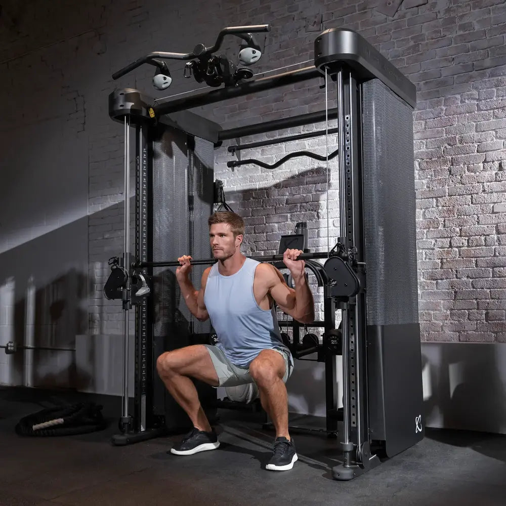 Man exercising on a weight machine in a gym setting