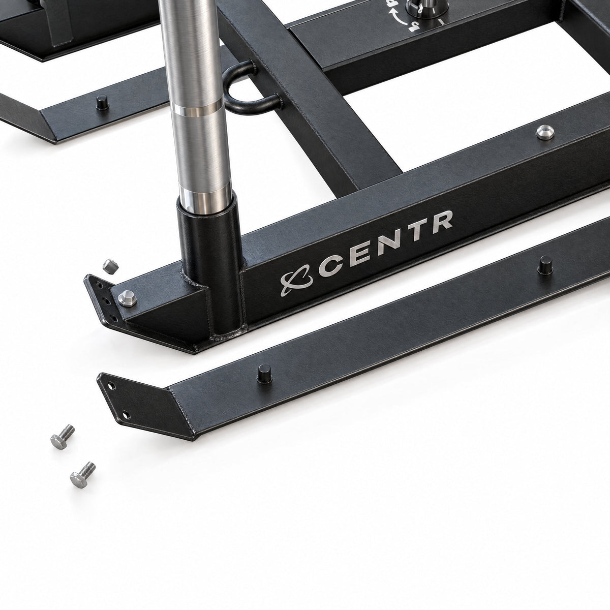 Gros plan d’un patin remplaçable à côté du cadre du Centr x HYROX Power Sled et des vis de fixation
